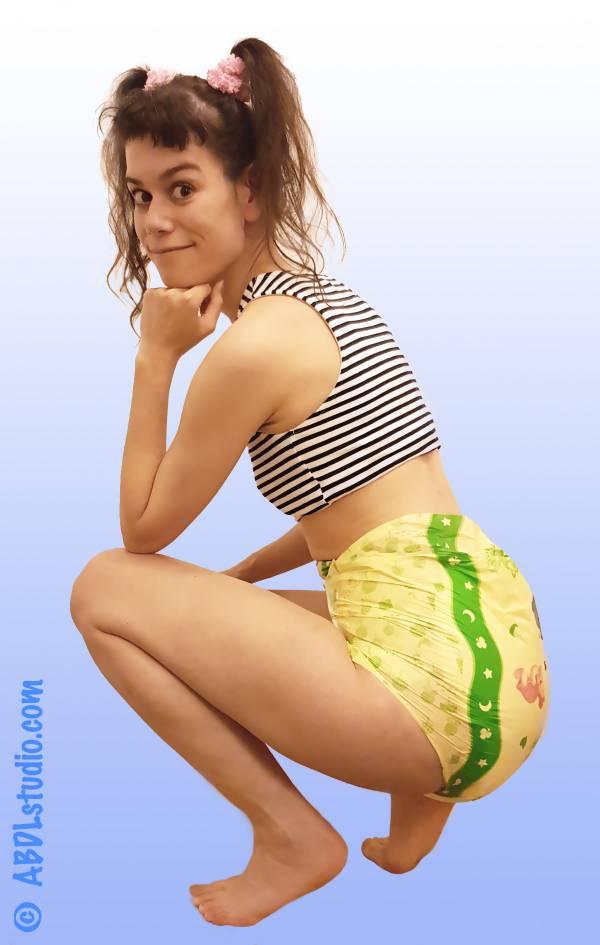 Emma wearing MyDiaper yellow diaper