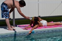 Doctor Teddy • Day at the pool feeding my little girl a snack. So...