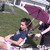 Teen Baby Girl Nikki Gets Pushed In A Stroller Through A Public Park